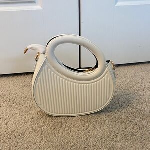 Structured White Women's Handbag with Top Handle from boutique!